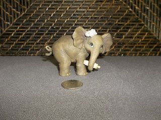 Miniature figurine baby elephant with bottle pink bow 1996HC ceramic