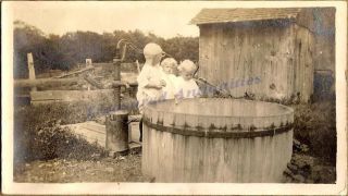 1910s Young Toddler Girls Standing at Hand Water Pump Cistern Tank 