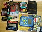   OPERATED HAND HELD GAMES. 8 GAME LOT ALL WORKED AND GOOD CONDITION