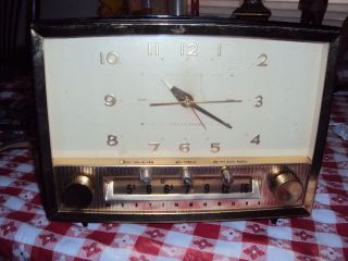 Westinghouse clock radio & Emerson battery/AC AM/FM portable radio