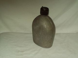   WW II Aluminum Canteen with attached cap stamped U.S. A.G.M. CO 1945