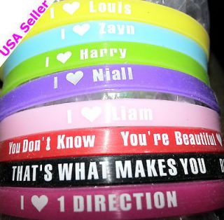 Newly listed Set of 8 One Direction 5 millimeter silicone bracelets 