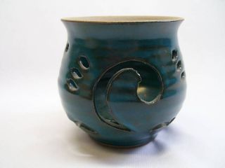 art pottery tealight candle holder cut out design teal