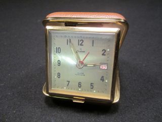 Vintage Endura Folding Travel Alarm Clock w/ Brown Leather Case. Has 