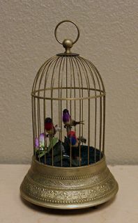 ANIMATED SINGING BIRD in a BRASS CAGE MUSIC BOX