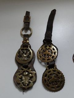 leather straps horse brasses