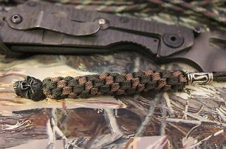 Tactical Paracord Knife lanyard with a black Emerson skull O.D. Green 