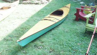 wooden kayak in Kayaks