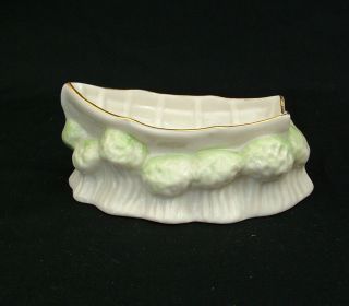Belleek Porcelain rowing boat shaped ashtray or salt dish