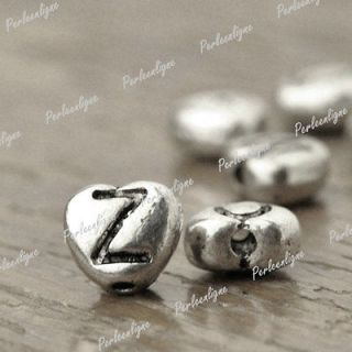 silver tibetan alphabet beads