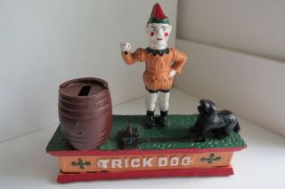 Vintage cast iron trick dog money box piggy bank