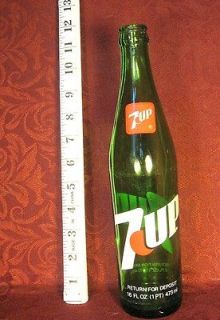 Vintage 7up bottle pair (green glass)  7 & 12fl ozs  