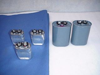 CAPACITORS* GE [5] AC. [3] 1.5 UF AND [2] 6.5 UFNEW.