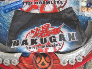 bakugan battle brawlers arena in bag, and 4 books battle box & 3 