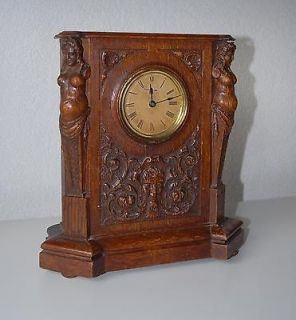   Carved Wood Mantel clock, with drum case, made by Ansonia Clock