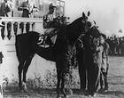1943 E Count Fleet, winner of 1943 Ky. Derby. Jockey on horse after 