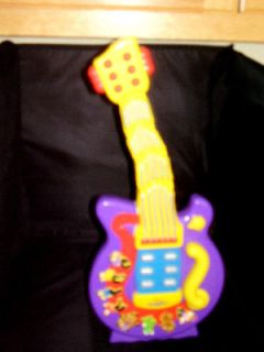 Dancing Toy Wiggles Guitar, Works Great with Batteries included