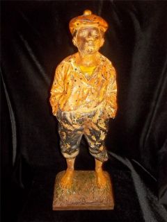  MOST VALUABLE CASTIRON DOORSTOP WHISTLING JIM BY BRADLEY HUBBARD