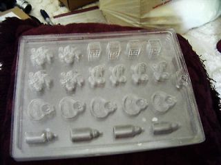 four 4 sheets of baby item molds 