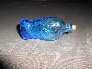 Miniature blue glass fish figurine bottle with cork stopper