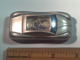   /cigarett​e lighter car shaped front opening torch style refillable