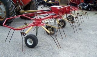 Used Tonutti 17 1/2 ft Hay Tedder, Pull Type  We can ship this Tedder 