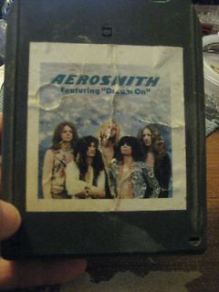Lot of 3  8 Track Tapes Queen, AeroSmith and Every which way but loose