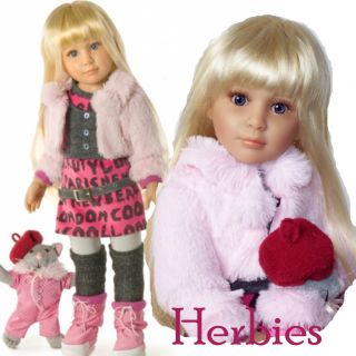Alexis wears pale pink faux fur jacket winter weight mini dress, grey 