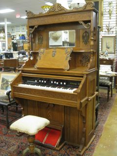 Click the pictures to see our video of this antique pump organ