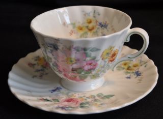 presenting an elegant royal doulton cup saucer set in the arcadia