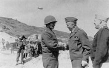   Henry H. Arnold confer with Bradley on the beach at Normandy in 1944