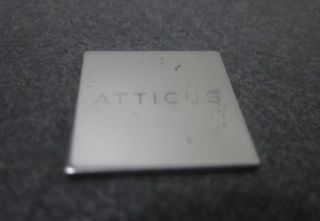 you are bidding on a new atticus black silver toned marble cutting 