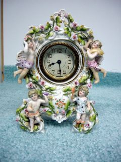 Antique Ansonia Porcelain Mantle Clock w Figurine Design