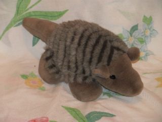 plush stuffed armadillo possum on a half shell