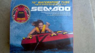    Doo Water Tube Get on your belly and Doo it in a lake Tied to a boat