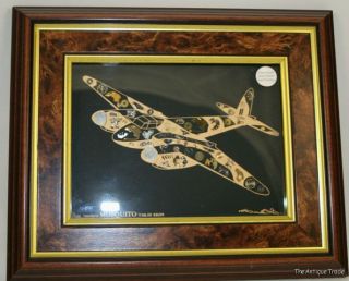   art collage of Mosquito plane by Ken Broadbent made from watch parts