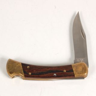 up for sale is this pre owned buck 110 lockback folding pocket knife 