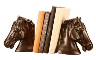 These horse head bookends are cast in solid bronze and have an oil 