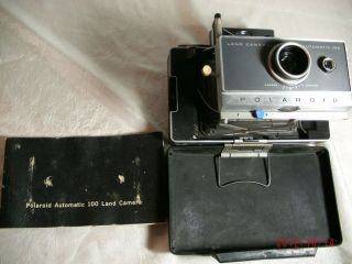 Vintage Polaroid Automatic 100 Land Camera with manual, case and 