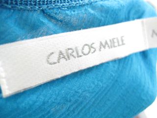 you are bidding on a carlos miele blue sleeveless top shirt in a size 