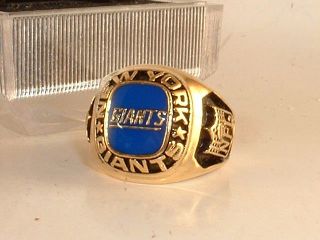 ring box supplied center is team blue color with clear dome over it 