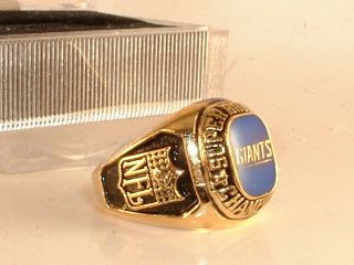 ring box supplied center is team blue color with clear dome over it 