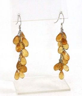 this is an elegant pair of 18k gold and citrine ladies dangle earrings