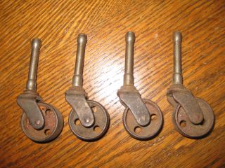 Antique Vintage Set of 4 Matching Cast Iron Coaster Wheels