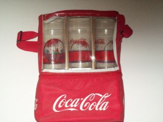 coca cola cooler with glasses
