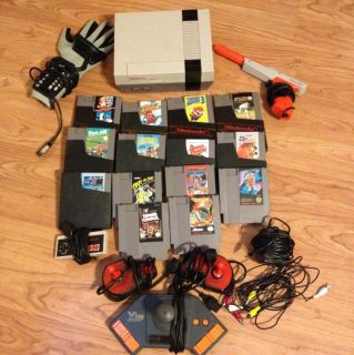 NINTENDO Console NES with 14 Games, 4 controllers, zapper gun, & Power