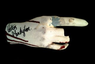 BLOODY SAW HAND AUTOGRAPHED BY COSTAS MANDYLOR (HOFFMAN)