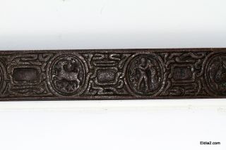 bronze zodiac blotter end 19 inches in length and 2 inches in width