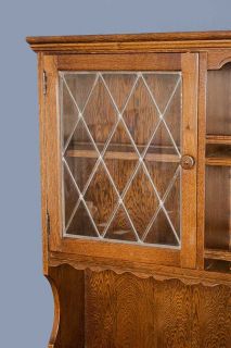 each leaded glass door has one shelf
