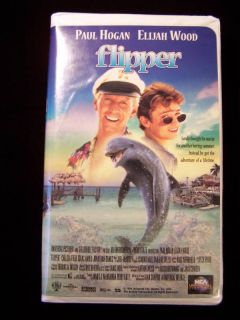 Flipper Paul Hogan Elijah Wood VHS 096898282536